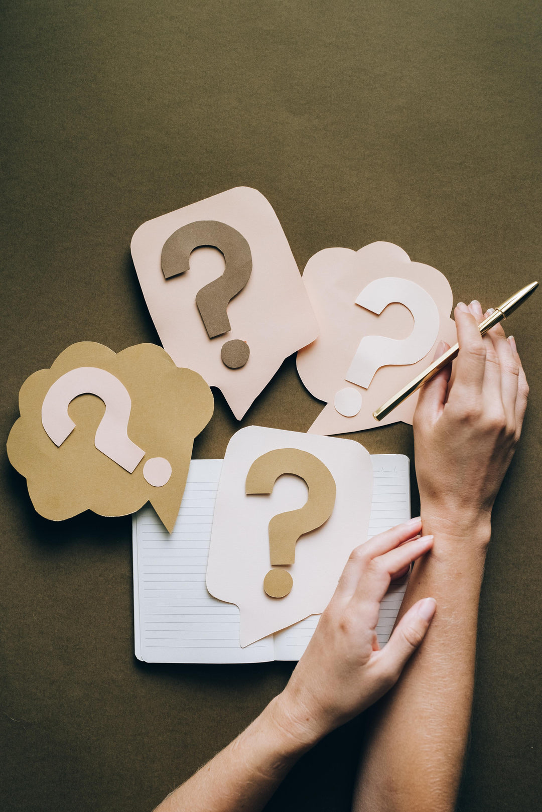 question marks on different paper